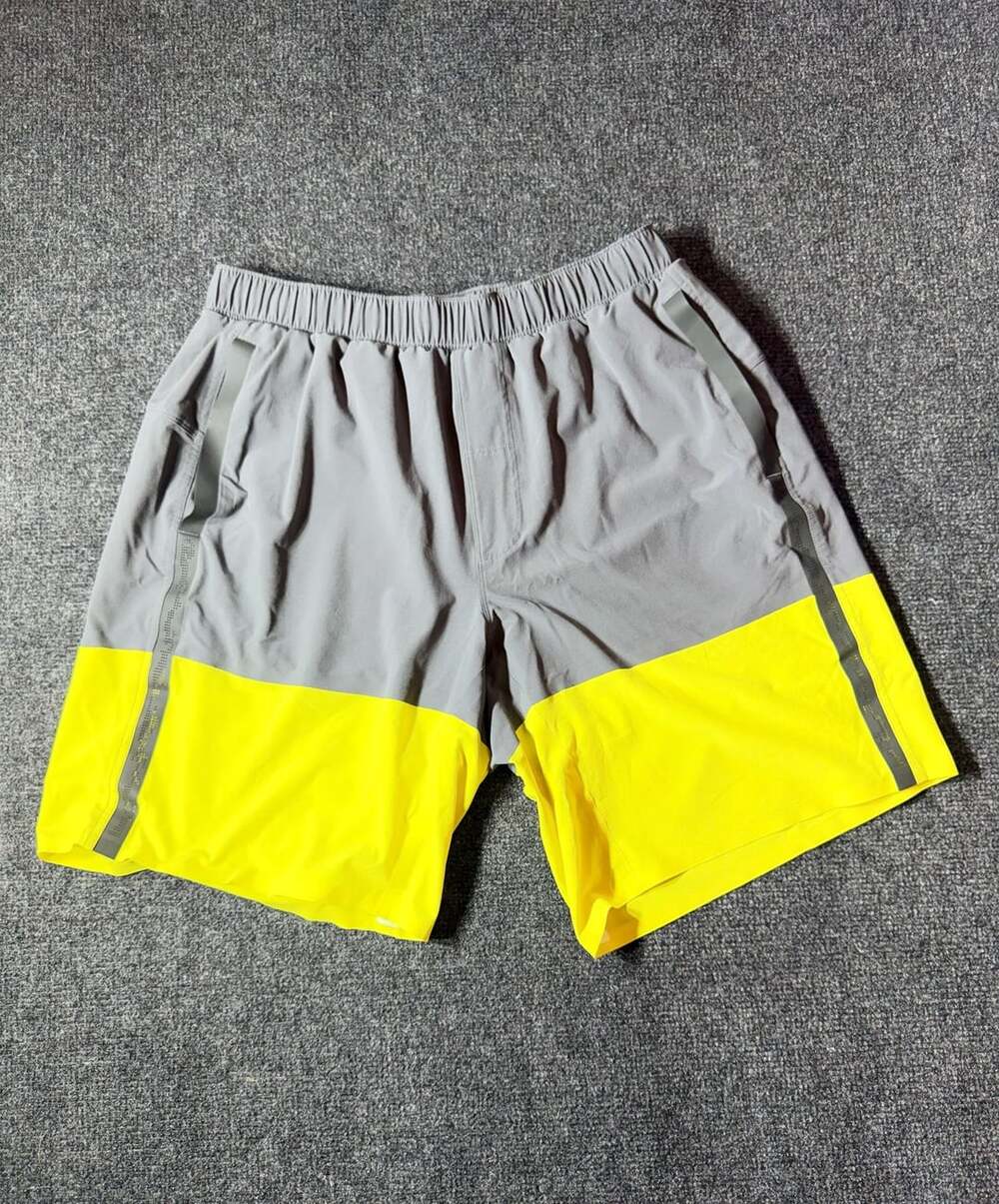 Lululemon Men's Grey and Yellow Athletic Shorts with Zipper Pockets